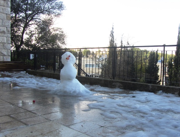 snowman melting, Jerusalem photo
