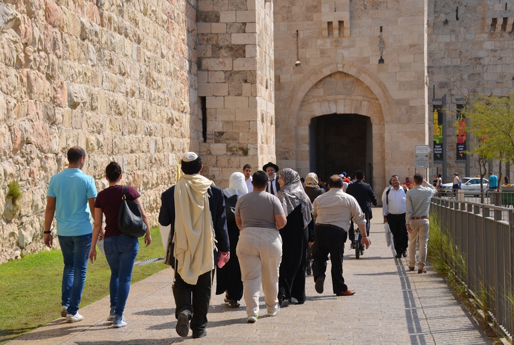 Muslims and Jews going to Jaffa Gate on Friday sukkot